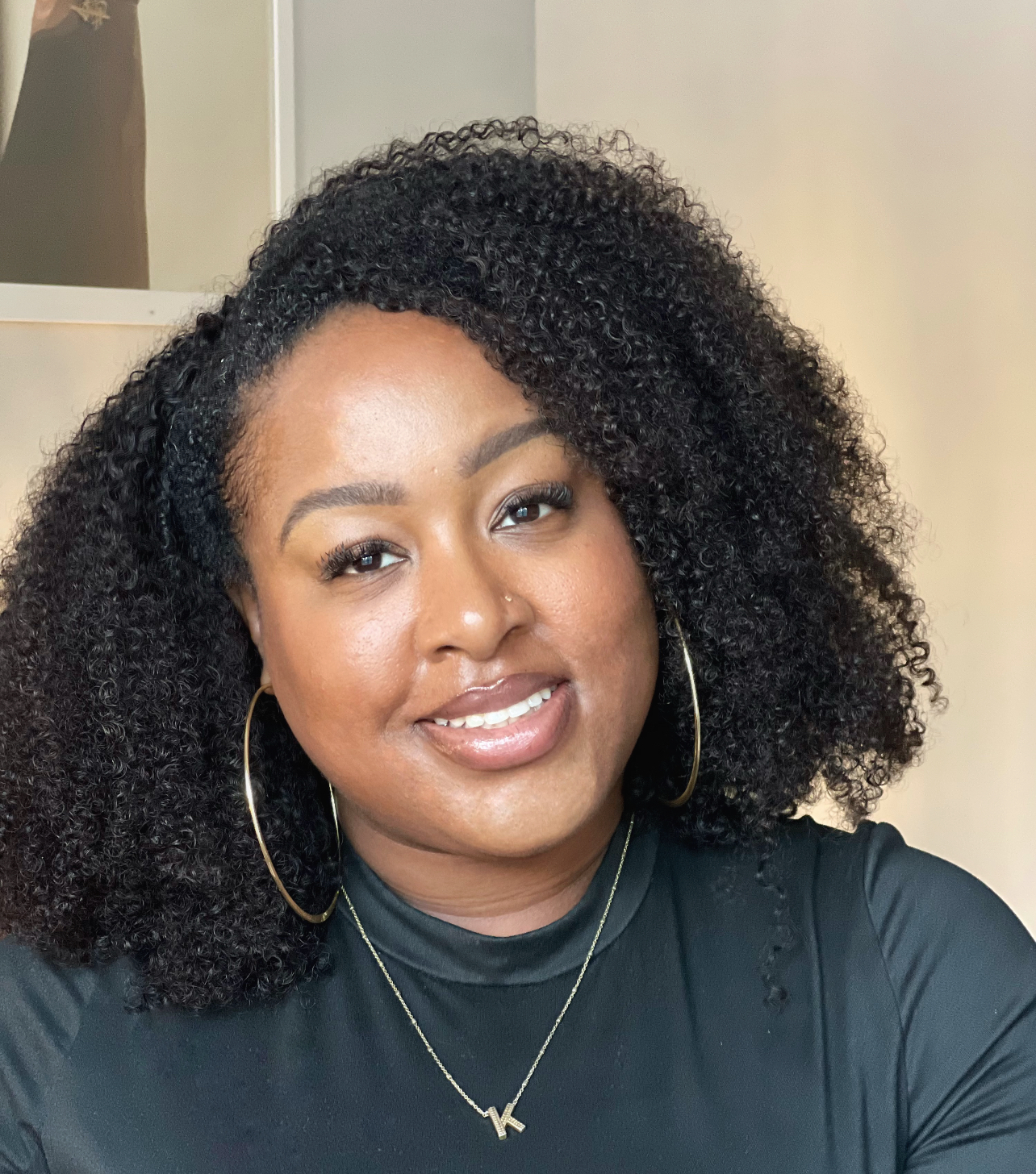 Kedra B., UGC creator, smiling to camera